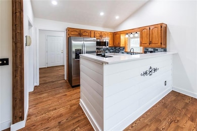 Bar separates kitchen and dining room