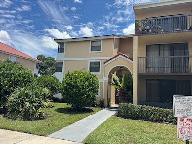 5661 Riverside Dr unit 101B7, Coral Springs, FL 33067 - photo 2