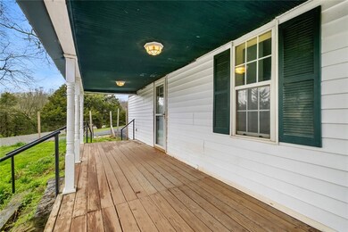 Relax on the front porch and enjoy the beautiful a