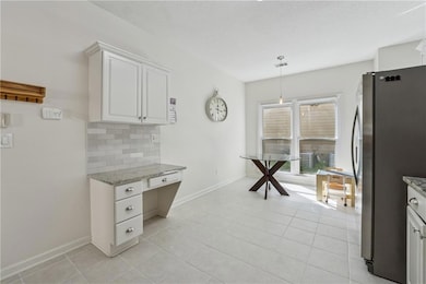 Kitchen with freestanding refrigerator, tasteful b