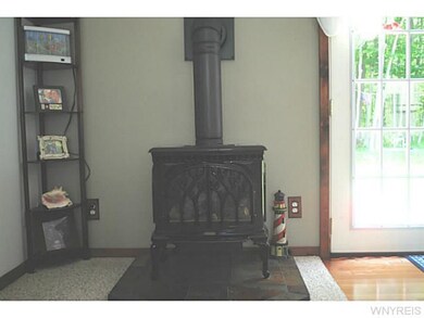 Living Room. Living room has a functional wood bur