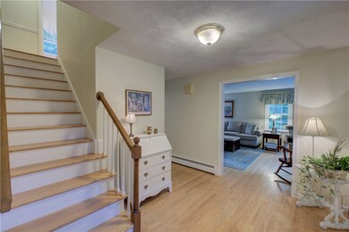 Foyer. Hardwoods. view of Living room.