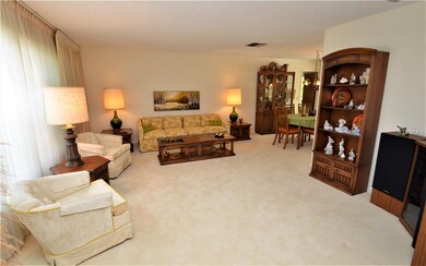 Spacious living area with that opens into the dini