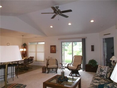 Living area is open to the dining area, breakfast 