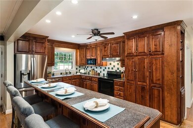 Spacious kitchen with large island, newer cabinetr