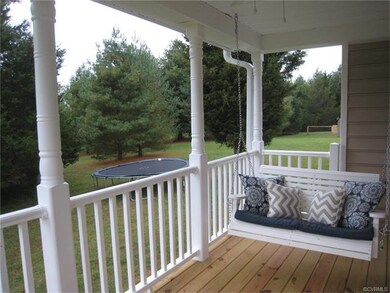Full wrap around country porch with maintenance fr