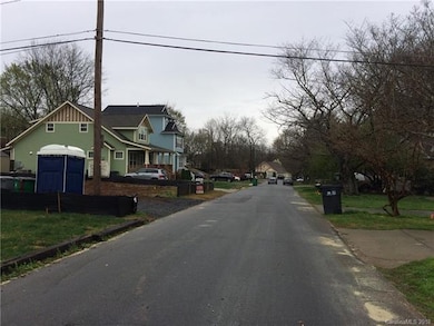 Picture of the street that has many new homes or n