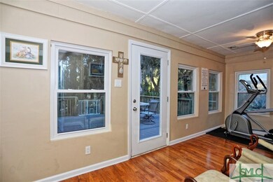 Sunroom overlooking Deck & Lake