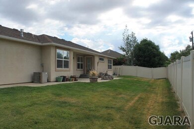 The front and rear yards are fully landscaped.