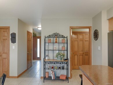 View of the kitchen with hallway from front door a
