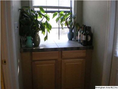 Storage area behind kitchen
