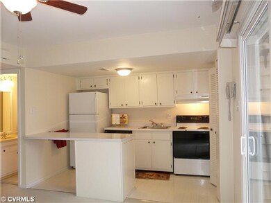 Kitchen - Freshly painted with new lighting!  Very