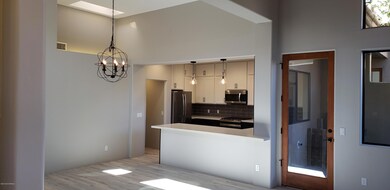 Living room view toward kitchen