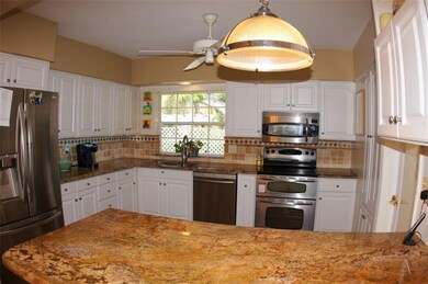 Updated Kitchen with Custom Cabinetry, Granite Cou