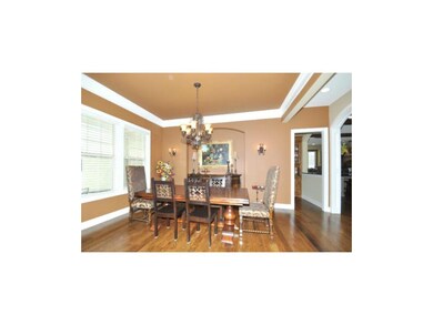 Large open dining room with hardwood floors