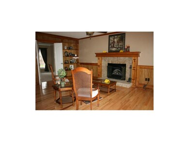 The Family Room has a fireplace with an electric i