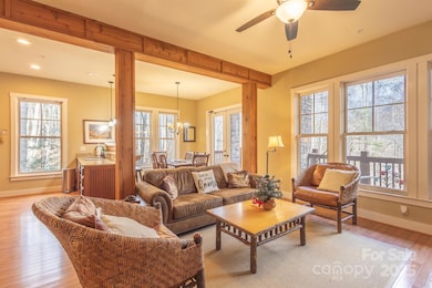 Living Room Opens to Dining and Kitchen