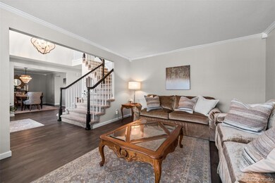 Front room has crown moulding and sits to the right as you enter the home