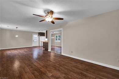 Living room looking into kitchen