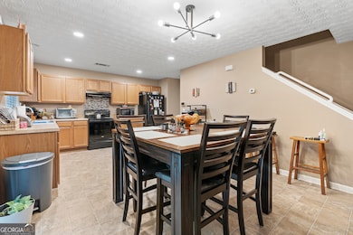 5440 Sable Bay Point, Atlanta, GA 30349 - photo 6