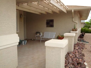 FRONT TILED PARTIAL COVERED FRONT PATIO