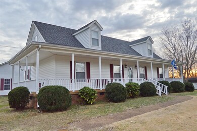 Covered front and side porch