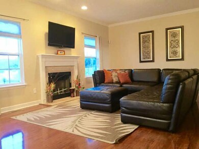 Spacious great room w/ cozy wood burning fireplace