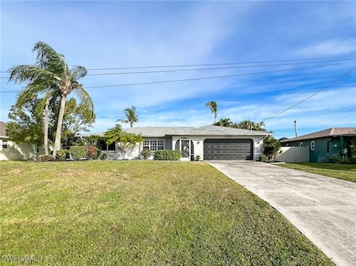 Single story home featuring an attached garage, dr