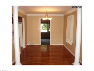 Nice view to formal dining room with gleaming hard