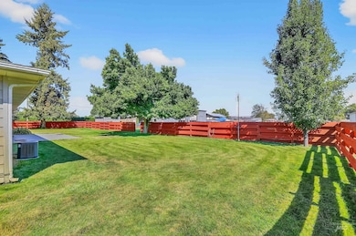 View of fenced backyard
