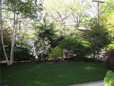 Yard/Garden. Front yard has grass and specimen pla