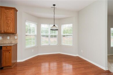 Breakfast nook bump out is a spacious place to enj