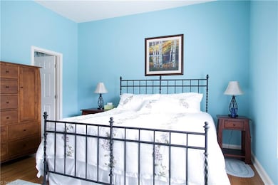 One of 2 master suites on main level with beautiful private bath and view of the lake out the big window.