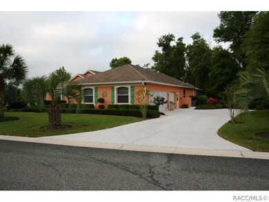VIEW TO DRIVEWAY AND GARAGE