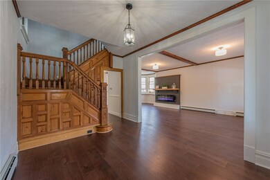 Beautiful entryway with hardwood flooring