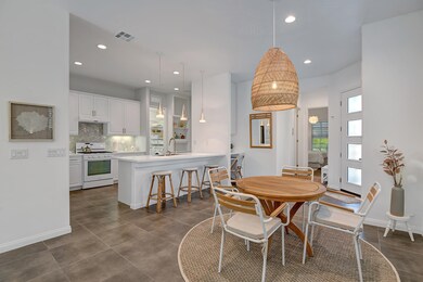 DINING ROOM TO KITCHEN AND ENTRY MLS