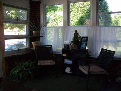 Sunroom. Comfortable enclosed sun porch