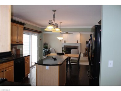 Center island with granite top, overhang for seati