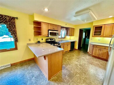 Kitchen featuring appliances with stainless steel 