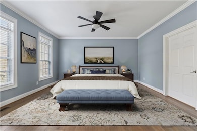 Virtually Staged - Bedroom featuring wood finished