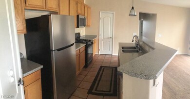 Kitchen featuring appliances with stainless steel