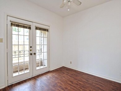 Doorway to outside with baseboards, french doors,