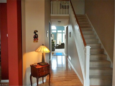 The foyer extends back to the kitchen and great ro