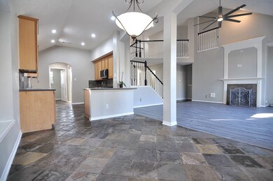 Breakfast area view into kitchen and living room