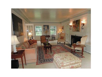 Living Room. Views of the gardens; French doors to