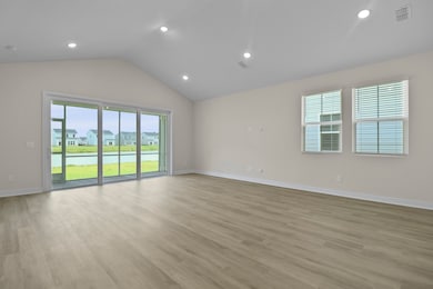 Great room with 12' multi-slide door to covered patio