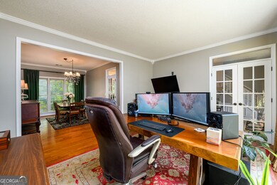 Living room adjoins the formal dining room