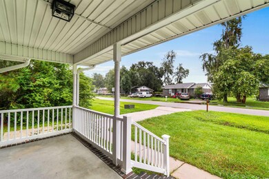View of patio with covered porch