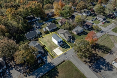 Aerial view of the home showing the massive parking area