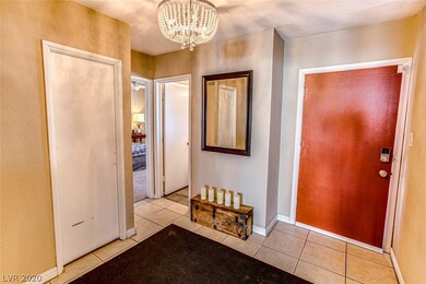 Enter into the front hallway with guest bed and ba